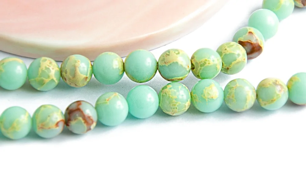 Perles rondes à facettes 8mm jaspe aqua terra imitation